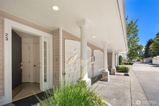 1900 132nd Ave SE Unit I-23, Bellevue, WA 98005 - view of exterior entry with a porch