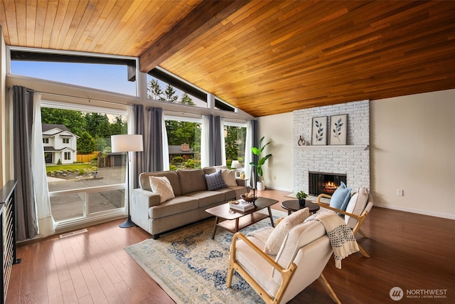 2012 SE 18th Ct, Renton, WA 98055 - living room with healthy amount of natural light, a brick fireplace, wooden ceiling, and hardwood / wood-style flooring