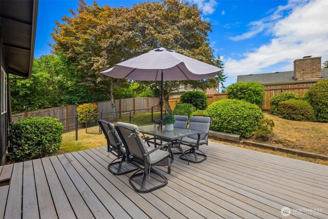 2012 SE 18th Ct, Renton, WA 98055 - wooden terrace featuring outdoor dining area and a fenced backyard