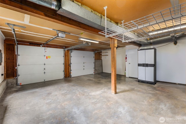 2012 SE 18th Ct, Renton, WA 98055 - garage with a garage door opener and electric panel