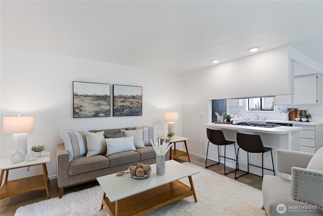 1708 24th Ct, Anacortes, WA 98221 - living room featuring light wood-style flooring and recessed lighting