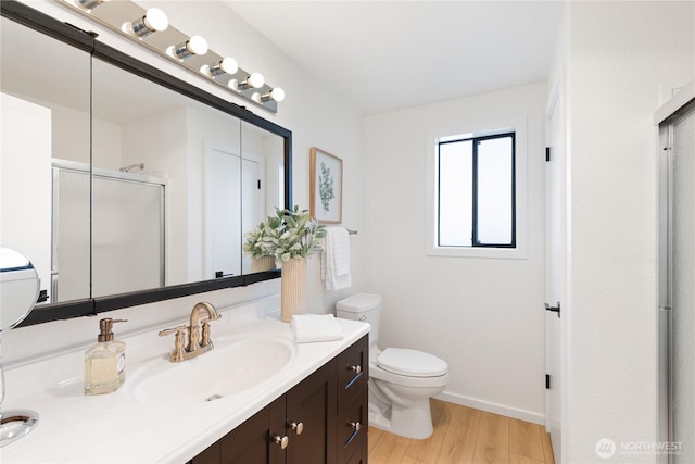 1708 24th Ct, Anacortes, WA 98221 - full bathroom with vanity, wood finished floors, and a stall shower