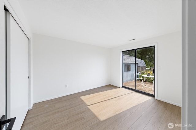 1708 24th Ct, Anacortes, WA 98221 - empty room featuring light wood-type flooring and baseboards
