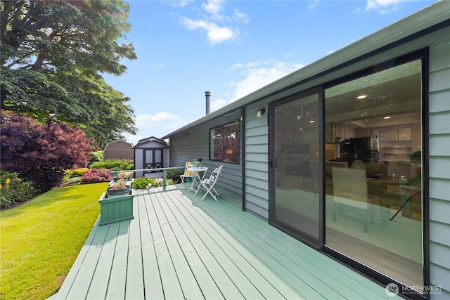 1708 24th Ct, Anacortes, WA 98221 - wooden deck with a storage shed and a lawn
