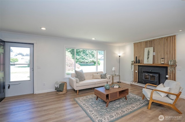 15512 Elm St E, Sumner, WA 98390 - living room with wood finished floors, ornamental molding, and recessed lighting