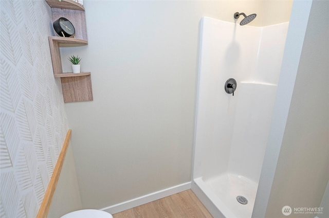 15512 Elm St E, Sumner, WA 98390 - full bathroom featuring wallpapered walls, walk in shower, and wood finished floors