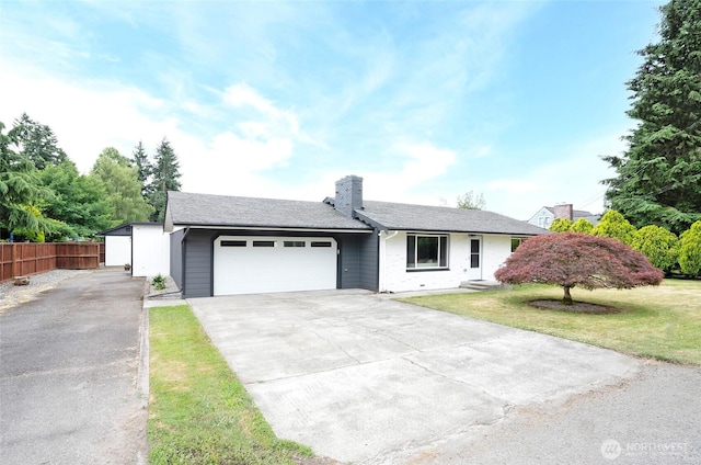 15512 Elm St E, Sumner, WA 98390 - ranch-style house featuring concrete driveway, a chimney, and an attached garage
