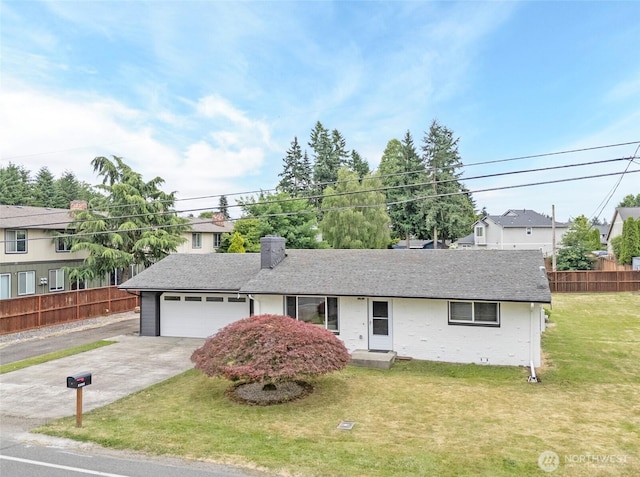 15512 Elm St E, Sumner, WA 98390 - single story home with concrete driveway, a shingled roof, a chimney, and a garage