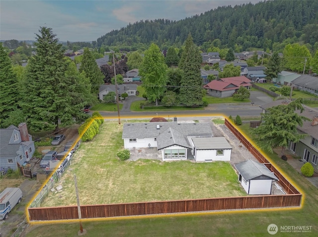 15512 Elm St E, Sumner, WA 98390 - aerial perspective of suburban area featuring a heavily wooded area