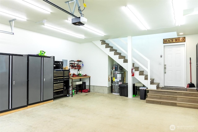 29813 L Ln, Ocean Park, WA 98640 - garage featuring hybrid water heater and a garage door opener