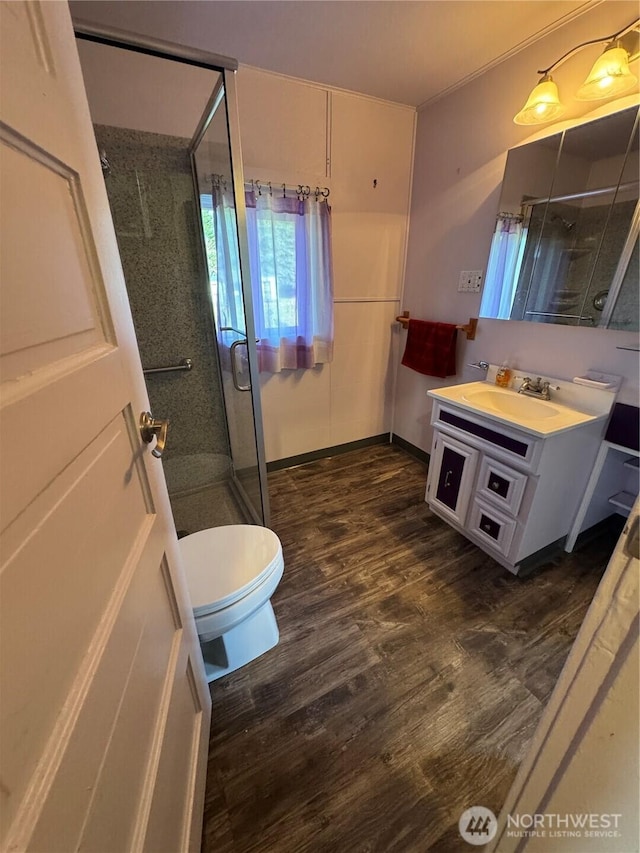 2520 Eureka Ave, Centralia, WA 98531 - bathroom with a shower stall, vanity, and wood finished floors