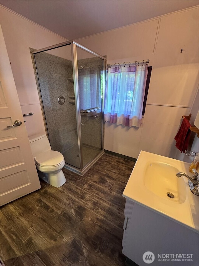 2520 Eureka Ave, Centralia, WA 98531 - full bathroom featuring vanity, wood finished floors, and a shower stall