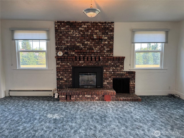 2520 Eureka Ave, Centralia, WA 98531 - unfurnished living room featuring baseboard heating, a brick fireplace, carpet floors, and healthy amount of natural light