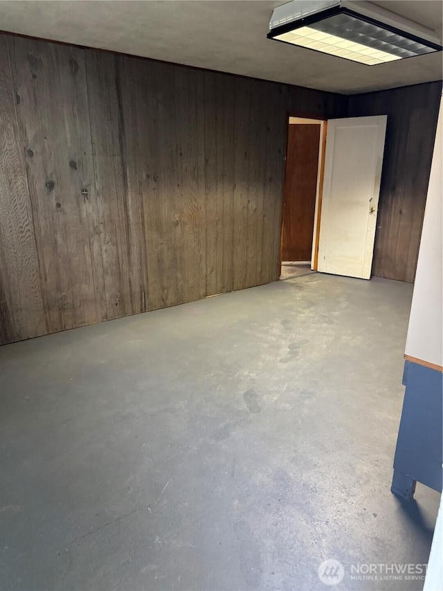 2520 Eureka Ave, Centralia, WA 98531 - unfurnished room with concrete flooring and wood walls
