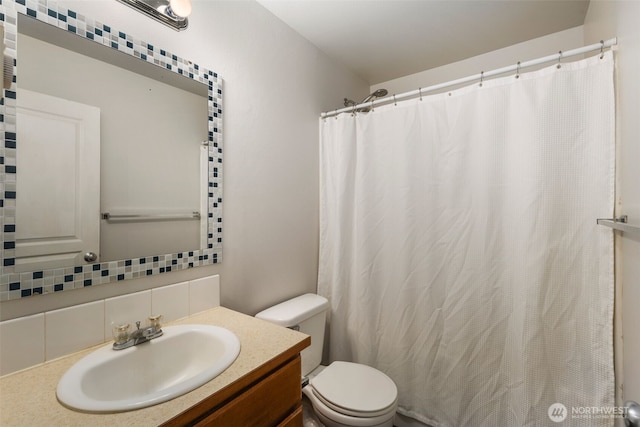 5542 55th Loop SE, Olympia, WA 98513 - full bathroom featuring decorative backsplash, vanity, and a shower with shower curtain