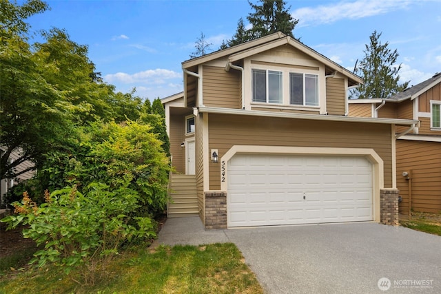 5542 55th Loop SE, Olympia, WA 98513 - view of front of house with driveway and a garage