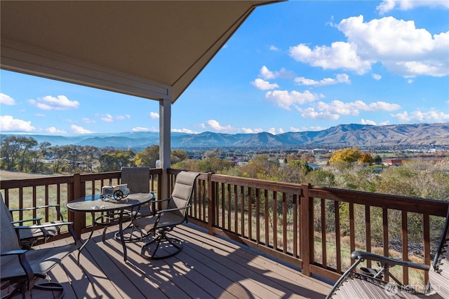 2599 NW Columbia Ave, East Wenatchee, WA 98802 - wooden terrace featuring a mountain view and outdoor dining area
