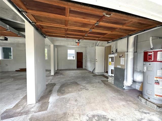 832 Whale Ct SW, Ocean Shores, WA 98569 - garage with water heater and heating unit