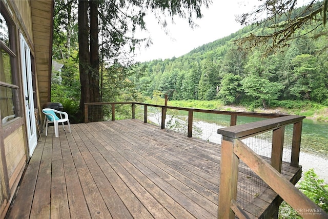 53009 S Riverside Rd, Gold Bar, WA 98251 - wooden deck featuring a view of trees