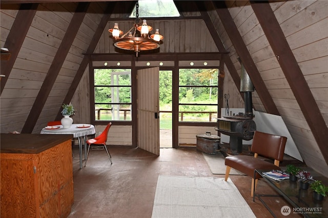 53009 S Riverside Rd, Gold Bar, WA 98251 - sunroom / solarium featuring a chandelier and a wood stove