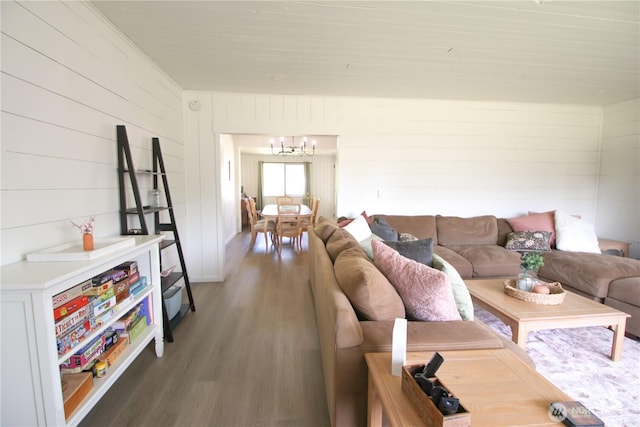 251 N 2nd St N, Buckley, WA 98321 - living area featuring wood finished floors, a chandelier, and wood walls