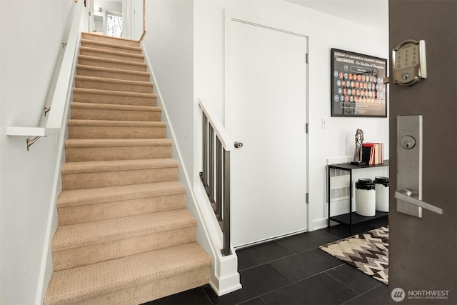 4220 Fremont Ave N Unit A, Seattle, WA 98103 - staircase with baseboards and tile patterned flooring