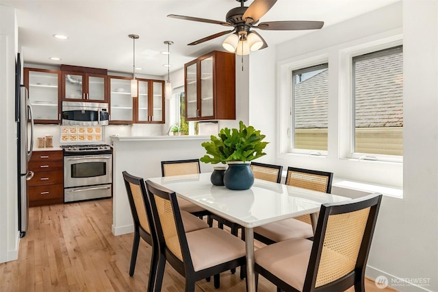 4220 Fremont Ave N Unit A, Seattle, WA 98103 - dining area featuring light wood-style floors, recessed lighting, and a ceiling fan