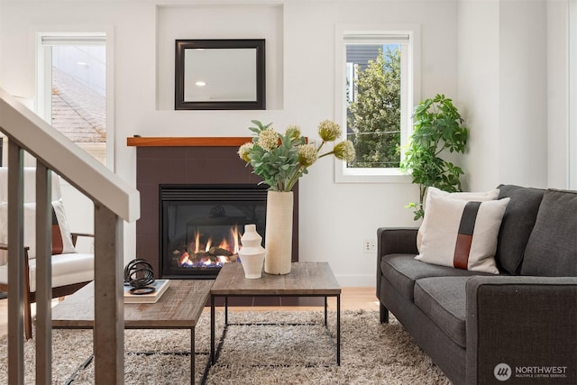4220 Fremont Ave N Unit A, Seattle, WA 98103 - living room with a tile fireplace and wood finished floors