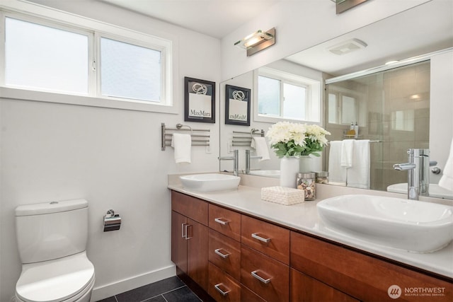 4220 Fremont Ave N Unit A, Seattle, WA 98103 - full bathroom with double vanity, tile patterned flooring, and a shower stall