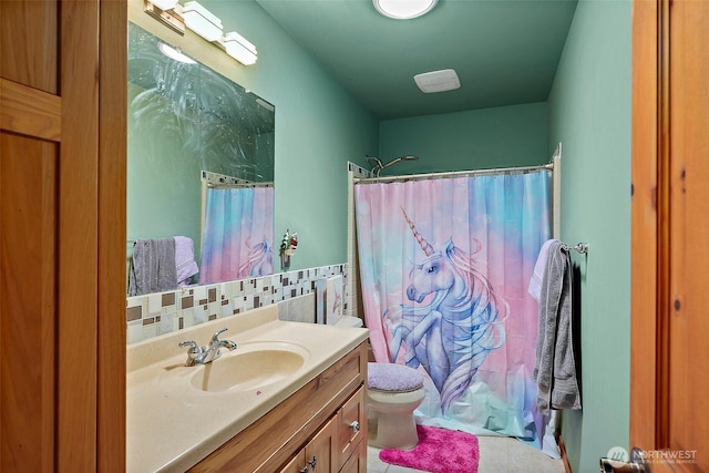 33320 27th Ave E, Roy, WA 98580 - bathroom featuring vanity, curtained shower, decorative backsplash, and tile patterned floors