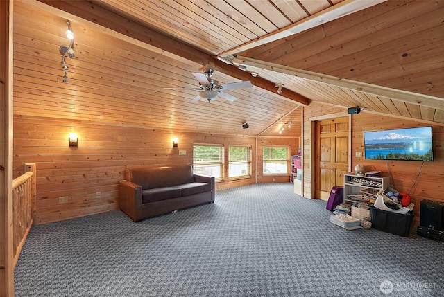 33320 27th Ave E, Roy, WA 98580 - living area with wooden walls, carpet floors, wood ceiling, and a ceiling fan