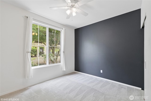 23757 SE 52nd Ln Unit 13-1, Issaquah, WA 98029 - spare room featuring carpet floors and a ceiling fan