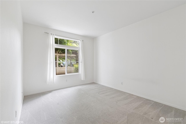 23757 SE 52nd Ln Unit 13-1, Issaquah, WA 98029 - carpeted spare room featuring baseboards