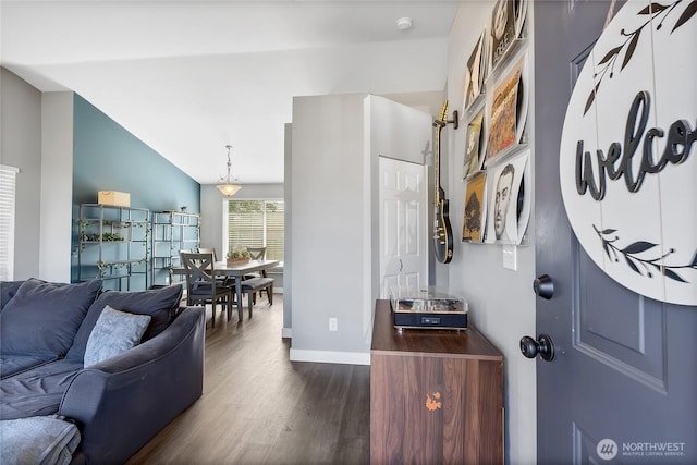 21812 41st Avenue Ct E, Spanaway, WA 98387 - living room featuring dark wood-style floors and baseboards