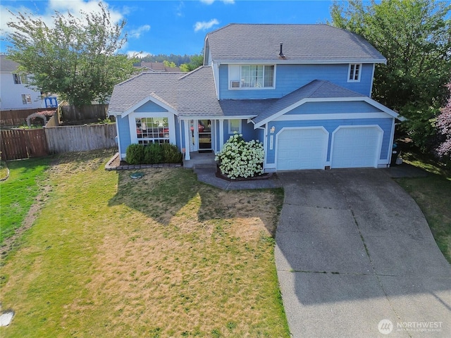 21812 41st Avenue Ct E, Spanaway, WA 98387 - traditional-style house featuring concrete driveway, a garage, and a shingled roof