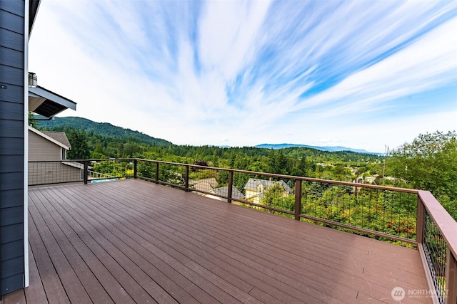 1818 36th St, Bellingham, WA 98226 - wooden deck featuring a mountain view and a view of trees