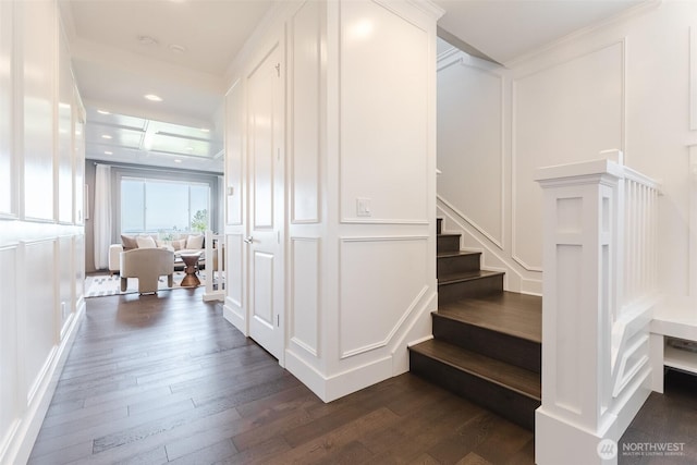 1818 36th St, Bellingham, WA 98226 - stairway featuring a decorative wall, wood finished floors, and recessed lighting