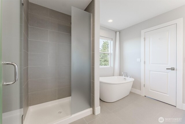 1818 36th St, Bellingham, WA 98226 - bathroom featuring a stall shower, a soaking tub, tile patterned floors, and recessed lighting