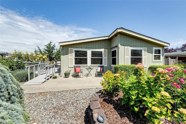 629 N 7th Ave, Sequim, WA 98382 - rear view of property featuring a patio