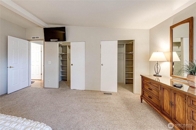 629 N 7th Ave, Sequim, WA 98382 - bedroom featuring a walk in closet and light carpet
