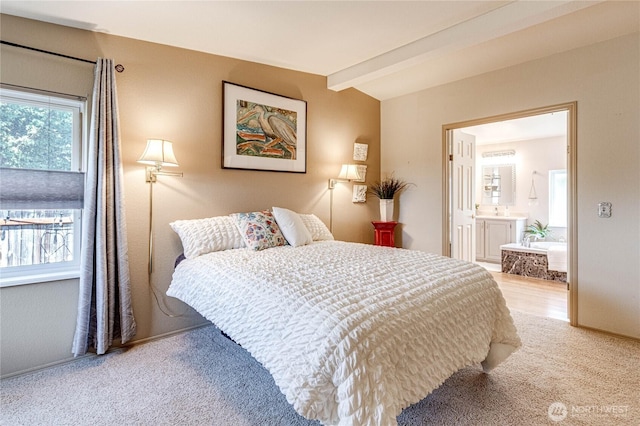 629 N 7th Ave, Sequim, WA 98382 - bedroom featuring carpet flooring, beamed ceiling, and ensuite bathroom