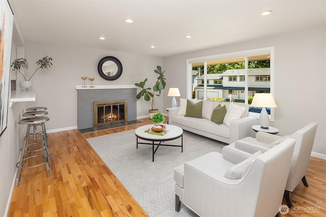 16011 Sunnyside Ave N, Shoreline, WA 98133 - living room with wood finished floors, a fireplace, and recessed lighting