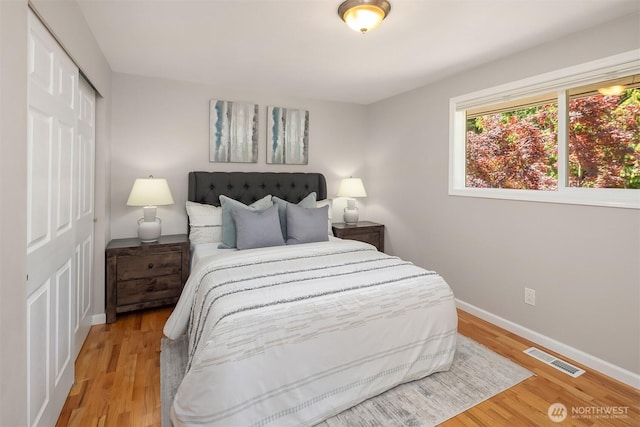 16011 Sunnyside Ave N, Shoreline, WA 98133 - bedroom with a closet and light wood-type flooring