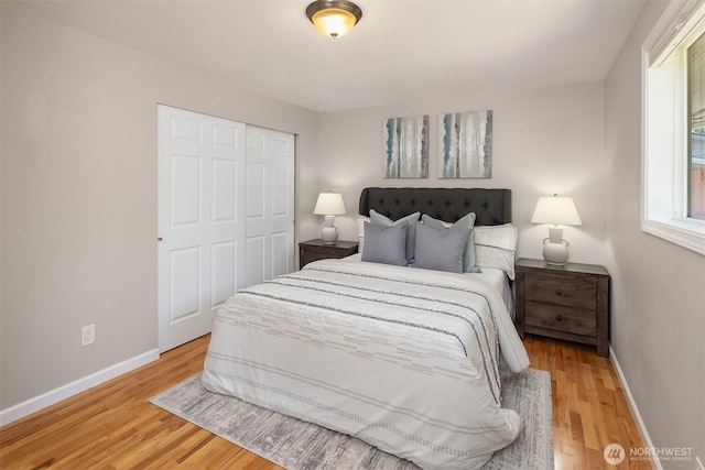 16011 Sunnyside Ave N, Shoreline, WA 98133 - bedroom with a closet and light wood-style flooring