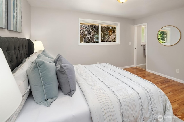 16011 Sunnyside Ave N, Shoreline, WA 98133 - bedroom with wood finished floors and baseboards