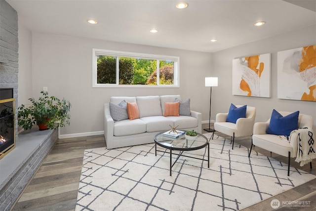 16011 Sunnyside Ave N, Shoreline, WA 98133 - living area with a fireplace, wood finished floors, and recessed lighting