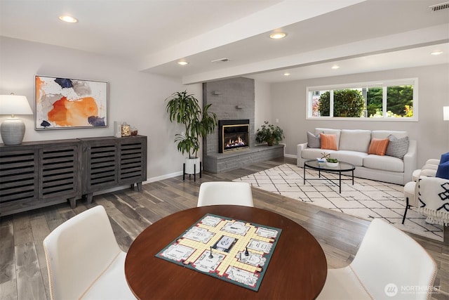 16011 Sunnyside Ave N, Shoreline, WA 98133 - living area featuring recessed lighting, wood finished floors, and a fireplace