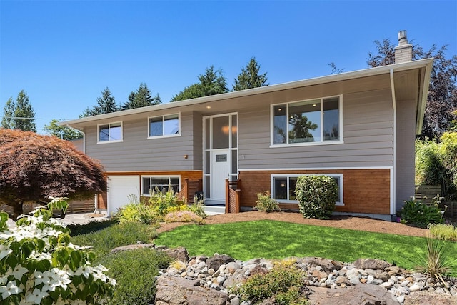 16011 Sunnyside Ave N, Shoreline, WA 98133 - raised ranch featuring a chimney, a front lawn, and an attached garage