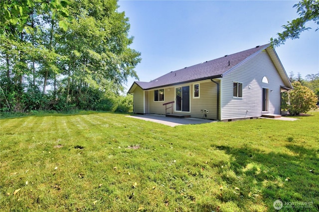 8391 Richmond Park Rd, Birch Bay, WA 98230 - rear view of house with a patio and a lawn