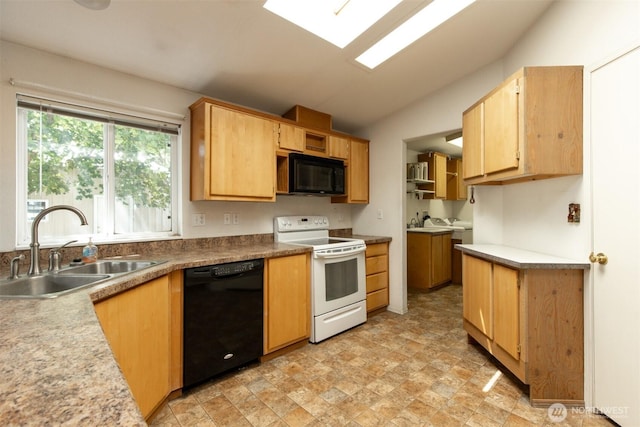 212S 3rd St, Almira, WA 99103 - kitchen with black appliances, vaulted ceiling, light brown cabinetry, and stone finish flooring